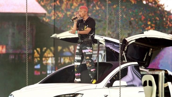 The fans stared above with bated breathe as they witnessed Smith hitting his song's high-notes while being suspended in the air.