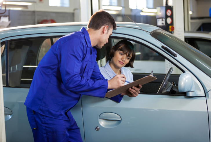 Learner driver showing documents before test