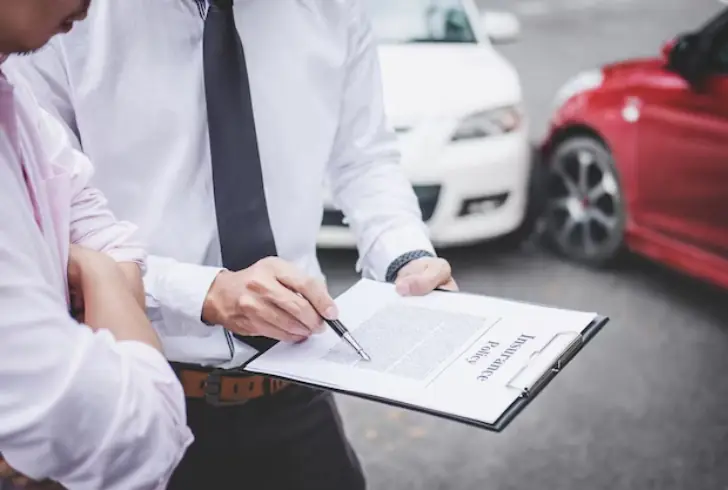 Car accident with insurance papers