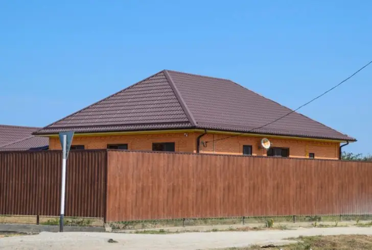 House with reinforced roof and shutters