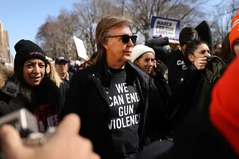 Beatles Legend Sir Paul McCartney Honors John Lennon by participating in March for Our Lives