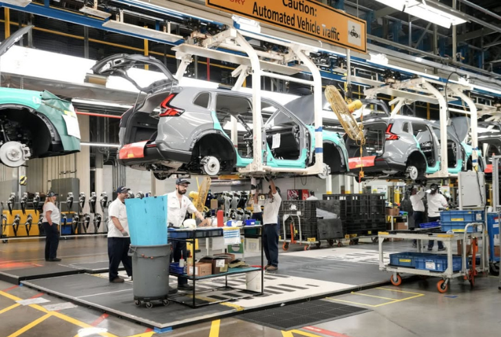 Canadian auto factory workers on floor